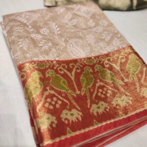 Beige Banarasi saree with Red Bird Motif Border .
